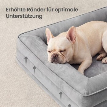 Schlafende Französische Bulldogge in grauem Hundebett mit erhöhter Kante. Sichtbarer Text: 'Erhöhte Ränder für optimale Unterstützung'.