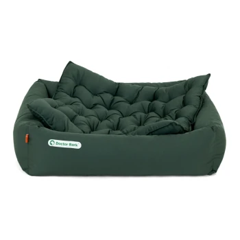 Grünes Haustierbett mit gepolstertem Design und erhöhten Rändern, mit dem Logo "Doctor Bark" an der Seite.