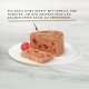 Ein Stück Katzenfutter aus Forelle und Tomaten auf einem weißen Teller, mit Text in Deutsch, der es als köstliches Rezept für anspruchsvolle Katzen bewirbt.