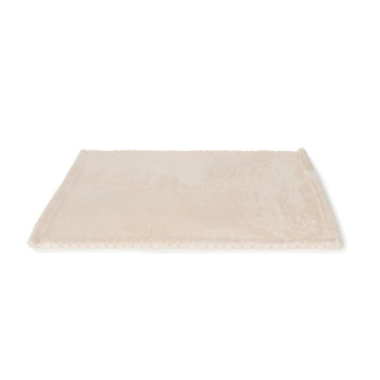 Tapis pour animaux de compagnie doux, beige, avec une surface texturée et des bords cousus, idéal pour le confort des animaux.