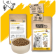 Zwei DOGS'n TIGER 'FLATTERTRAUM' Katzenfuttertüten (Leckeres Huhn & Ente mit Gemüse) mit Schale Trockenfutter und Katzenfoto.