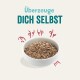 Schüssel mit Haustierfutter mit einer strukturierten, feuchten Erscheinung, begleitet von dem Text 'Überzeuge DICH SELBST' in fetten Buchstaben.
