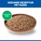 Bol de nourriture humide au poulet avec le texte « GESUNDE REZEPTUR MIT HUHN » et badge vert « NASSFUTTER IN DER DOSE »