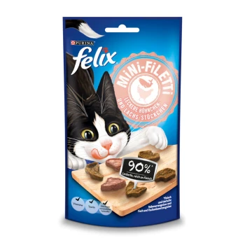 Eine verspielte schwarz-weiße Katze auf blauer Felix-Leckerliverpackung, die Hühner- und Lachsfilets mit "90% Leckerlis, reich an Fleisch" zeigt.