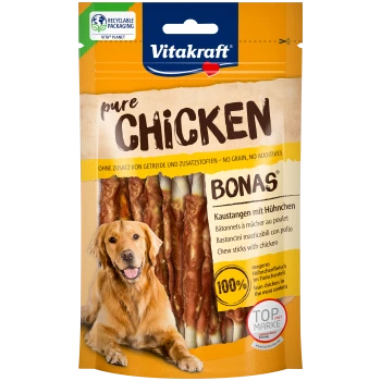 Vitakraft reine Hühnerkaustäbchen Verpackung mit einem Golden Retriever. Text hebt '100% mageres Huhn' und 'kein Getreide, keine Zusatzstoffe' hervor.