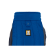 Eine blaue Hundejacke mit einem gesteppten Design und einem Ruffwear-Logo mit einer Hundedarstellung auf gelbem Hintergrund.