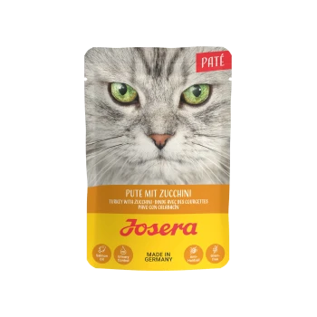 Katze Futterbeutel mit einer Nahaufnahme des Gesichts einer Katze, beschriftet mit "PATE" und "Truthahn mit Zucchini," mit Symbolen für Gesundheitsvorteile.