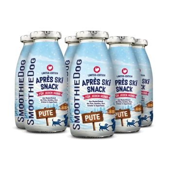 Sechs SmoothieDog „Après Ski Snack“ Limited‑Edition PUTE‑Hundesmoothie‑Flaschen mit verschneiter Hütten‑Illustration und Hundesilhouette auf dem Etikett.
