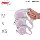 A hand holding three flexi retractable dog leashes in varying sizes (XS, S, M) with a lavender and white design, labeled "NEW COMFORT."