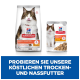 Hill's Science Plan Katzenfutterverpackung mit einer Katze, die die Zunge herausstreckt. Der Text lautet: "Probieren Sie unsere köstlichen Trocken- und Nassfutter."