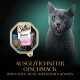 Sheba Sauce Collection Katzenfutterverpackung mit 'sauce lover mit Lachs', 85g, mit einer Katzensilhouette im Hintergrund.