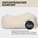 Ein entspannter Französischer Bulldogge in einem plüschigen Hundebett mit "sweet dreams" darüber, ausgestattet mit Cord-Stoff, Memory-Schaum und rutschfestem Design.