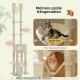 Beiger mehrstufiger Katzenbaum mit verstellbaren Stangen, breiten Plattformen, runden Körben, geräumigem Häuschen und Hängematte unten, mit zwei Katzen.