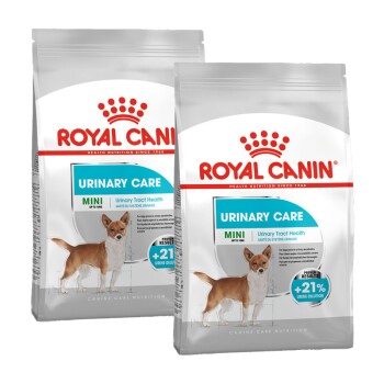 Zwei Tüten Royal Canin Urinary Care Mini Hundefutter, mit einem kleinen Hund auf der Vorderseite, der die Gesundheit der Harnwege und 21% Urinverdünnung betont.