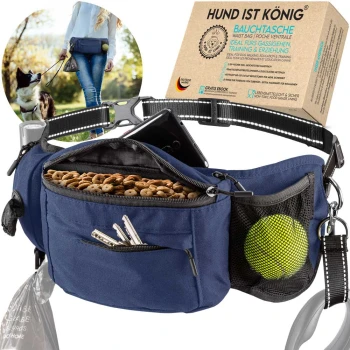 Eine blaue Bauchtasche für Hundebesitzer, mit Fächern für Hundeleckerlis, Schlüssel und einen Tennisball, mit dem sichtbaren Text 'HUND IST KÖNIG'.