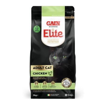 Black cat on a pet food bag labeled "GAIN Elute Complete Cat Nutrition," featuring "Adult Cat Chicken" and claims for health benefits.