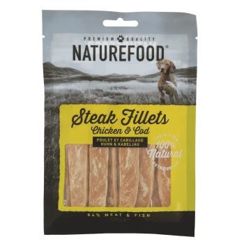 Naturefood Steak Fillets dla zwierząt, z kurczakiem i dorszem. Opakowanie podkreśla '100% Naturalne', 'Bez zbóż' i zawiera 84% mięsa i ryb.
