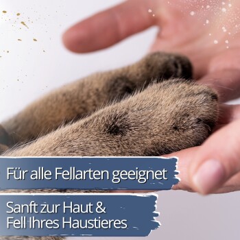 Nahaufnahme einer Haustierpfote in einer Menschenhand; deutscher Text: 'Für alle Fellarten geeignet' und 'Sanft zur Haut & Fell Ihres Haustieres'.