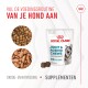 Royal Canin Joint & Ageing Chews voor honden, met een wolfachtige hond op de verpakking, met brokjes en kauwproducten weergegeven, en tekst die supplementen promoot.
