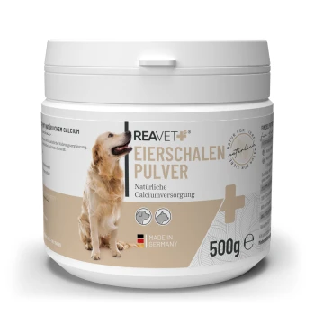 Behälter mit REAVET Eierschalen Pulver, einem natürlichen Kalziumpräparat für Hunde, mit einem Golden Retriever auf dem Etikett, 500g.