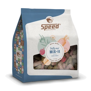 Tüte mit 'Speed' Tasty Mix MIX-it Pferdesnack, mit einem klaren Fenster, das bunte Leckereien zeigt, mit Illustrationen von Früchten und Gemüse.