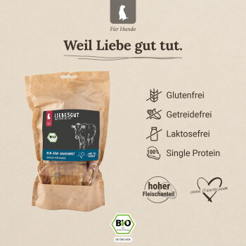 Liebesgut BIO braune Papiertüte mit Hundesnacks und Kuh-Grafik; Kennzeichnungen: glutenfrei, getreidefrei, laktosefrei.
