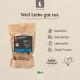 Liebesgut BIO braune Papiertüte mit Hundesnacks und Kuh-Grafik; Kennzeichnungen: glutenfrei, getreidefrei, laktosefrei.