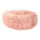 Lit pour animaux en peluche rond et moelleux de couleur rose doux, avec une texture douce pour le confort.