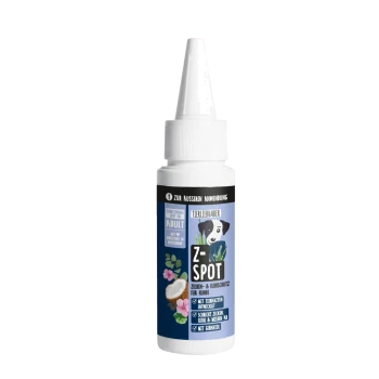 Eine Flasche Z-Spot für Hunde, mit einem blauen und rosa Design mit Pfotenabdrücken und dem Text "Z-SPOT für Hunde" auf dem Etikett.