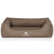 Braunes Haustierbett mit geripptem Design und erhöhten Kanten, mit dem Logo "KNUFFELWUFF" auf der Vorderseite.