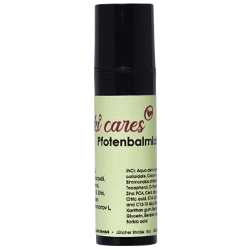 Schwarze Pumpflasche mit der Aufschrift "ski cares Pfotenbalsam" und einer Zutatenliste, die Wasser, Öle und Vitamine umfasst.
