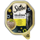 Nourriture pour chat Sheba Seasons Collection, présentant du poulet et des asperges dans une sauce crémeuse, emballage de 85 g avec un design floral.