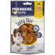 Verpackung für Hundeleckerlis mit einem lächelnden Hund, beschriftet mit "Premiere. I ❤️ my dog" mit "Tasty Duo Snacks" und Geschmacksrichtungen: Huhn & Banane. 70g.