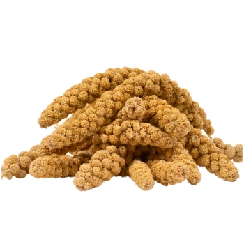Ein Haufen goldener Hirse-Sprays, mit kleinen, runden Samenkapseln, ideal für Vogelfutter.