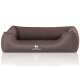 Braunes Hundebett mit erhöhten Seiten und einem weichen Kissen, mit dem Logo "KNUFFELWUFF" auf der Vorderseite.