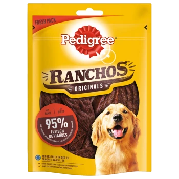 Emballage de friandises pour chiens Pedigree Ranchos Originals mettant en vedette un golden retriever souriant et indiquant "95% Fleisch" sur un fond jaune.
