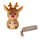 Plush reindeer dog toy with blue eyes and red nose next to a clear container spilling dried pet herbs.