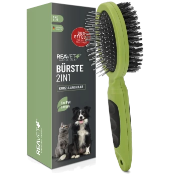 Eine grüne und schwarze 2-in-1 Haustierbürste mit einer Box, die "REAVET care me BÜRSTE 2IN1 KURZ-LANGHAAR" zeigt, mit einem Bild von einer Katze und einem Hund.