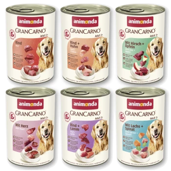 Zes Animonda GranCarno hondenvoerblikjes met een glimlachende hond en zichtbare smaaknamen: Rund, Rund+Kip, Met Zalm+Spinazie