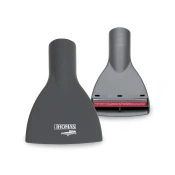 Graues Haustierpflegewerkzeug mit einer breiten Klinge und einer roten Gummikante, mit dem "THOMAS"-Logo auf der Vorderseite.