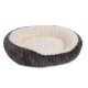 Rundes Haustierbett mit einem plüschigen cremefarbenen Innenraum und einem dunkelgrauen gerippten Äußeren, entworfen für Komfort und Stil.