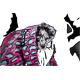 Ein kleiner, gefleckter Welpe mit blauen Augen schaut aus einer bunten, pink- und türkisfarbenen gemusterten Haustierjacke heraus.