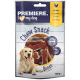 Złoty retriever siedzi obok paczki przysmaków do żucia "Premiere I ♥ my dog", zawierającej przysmaki w kształcie kości o smaku kurczaka.