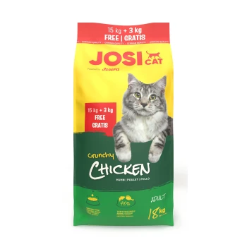 Gelb-grüne JOSI CAT Crunchy Chicken Katzenfuttertüte für erwachsene Katzen mit Foto einer grau getigerten Katze, Aufdruck '15 kg + 3 kg FREE | GRATIS' und '18 kg'.