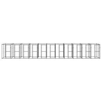 Ein langes, rechteckiges Haustiergehege mit mehreren einzelnen Fächern, mit Drahtgitterwänden und -türen.