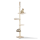 Un grand arbre à chat beige avec un hamac, un lit rond et un perchoir, présentant un chat crème duveteux en haut et un chat rayé au milieu.