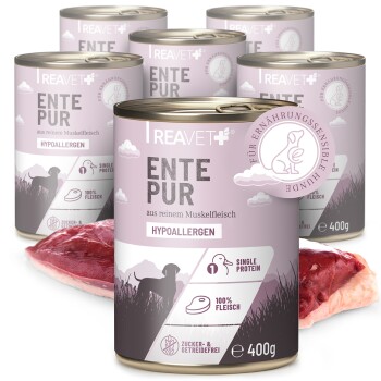Dosen von REAVET Ente Pur Hundefutter, beschriftet mit "Hypoallergen," mit einem rosa Design und Bildern eines Hundes und Fleisch, das ein einzelnes Protein hervorhebt.
