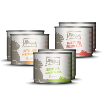 Blikken Mjamjam huisdiervoeding met smaken zoals "Saftiges Huhn," "Leckeres Rind," en "Mahlzeit mit leckeren Herzen."