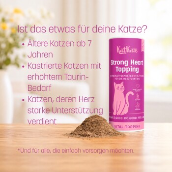 Rosa KatKare Strong Heart Topping-Dose und Pulverhaufen auf einem Tisch, mit deutscher Überschrift „Ist das etwas für deine Katze?“