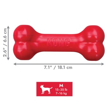 Red KONG dog bone toy, size medium for dogs 15-35 lb, measuring 7.1" x 2.6" (18.1 x 6.6 cm)